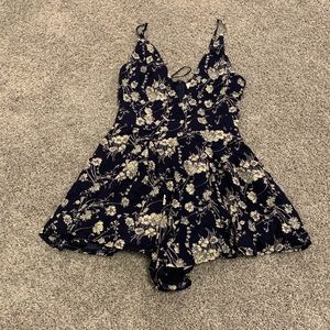 Showpiece Navy Floral Romper